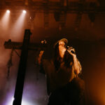 Ethel Cain performing live at Auckland Town Hall during her 2026 concert.