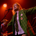 Live performance of The Darkness at Powerstation, Auckland, showcasing energetic stage presence and.