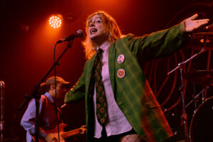 Live performance of The Darkness at Powerstation, Auckland, showcasing energetic stage presence and.