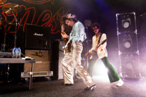 The Darkness performing on stage at Powerstation, Auckland, during a concert on February 17, 2026.