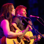Deacon Blue performing live with acoustic guitars at Bruce Mason Centre, Auckland, NZ.