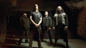 Band performing on stage at The 13th Floor, promoting the ORIGIN Aotearoa Tour.